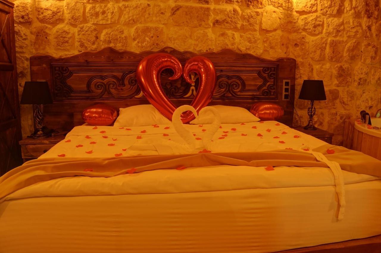 Dionysos Cave Cappadocia Hotel อูร์กุบ ภายนอก รูปภาพ
